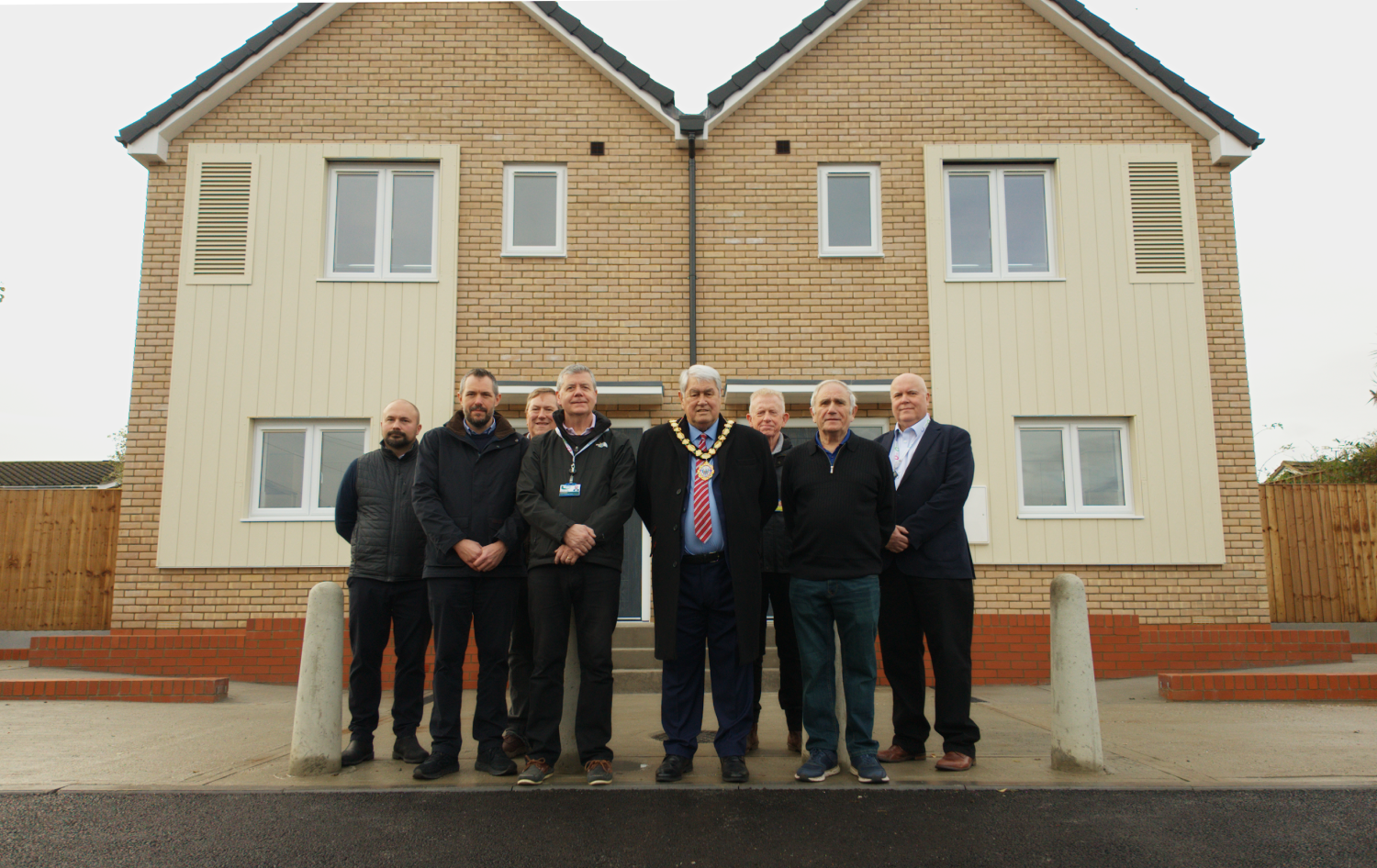 Councillors in front of new homes in Benderloch, Canvey Island